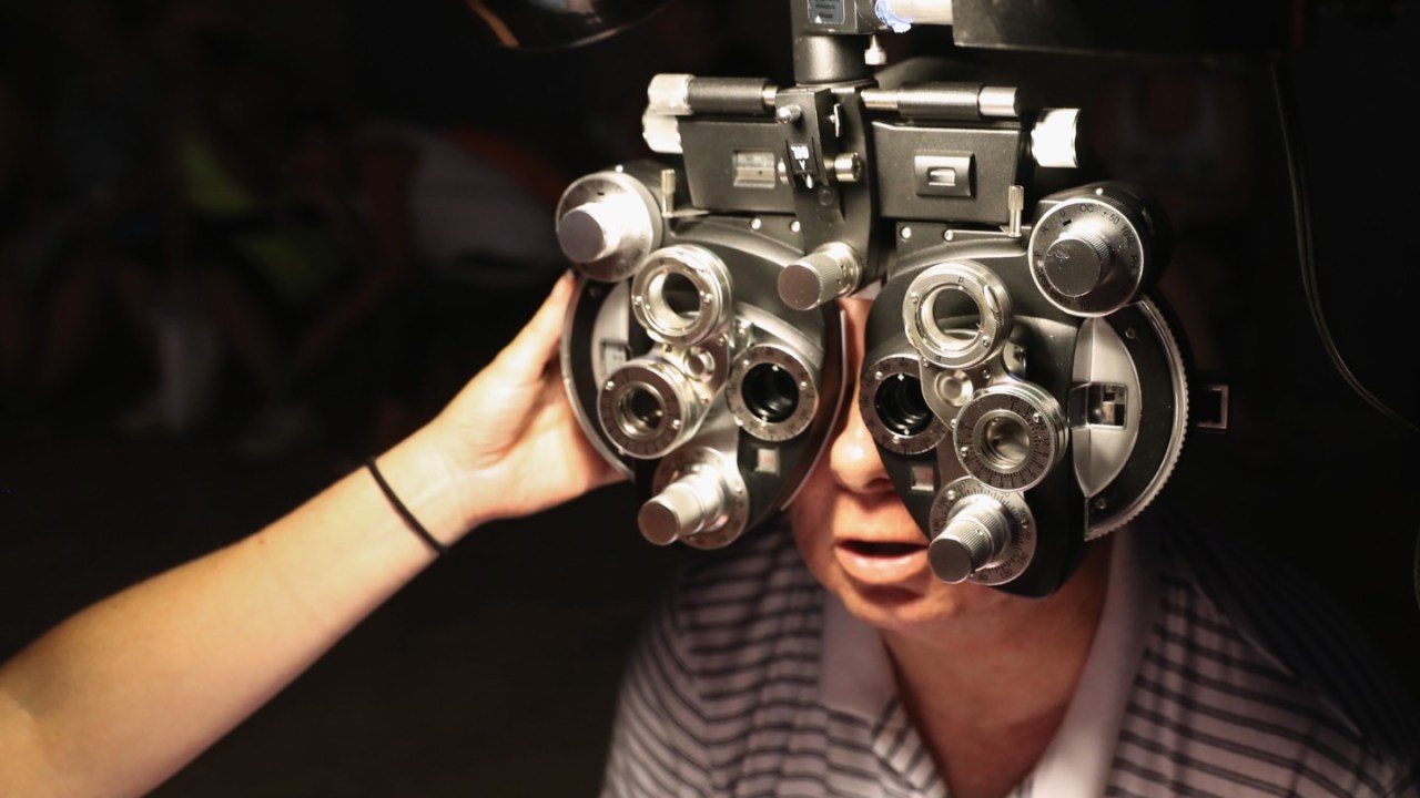 Photo showing person getting an eye exam, bionic eye, eyesight, blindness