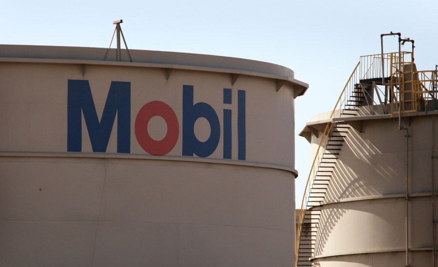 the exxon mobil logo on a gas storage tank