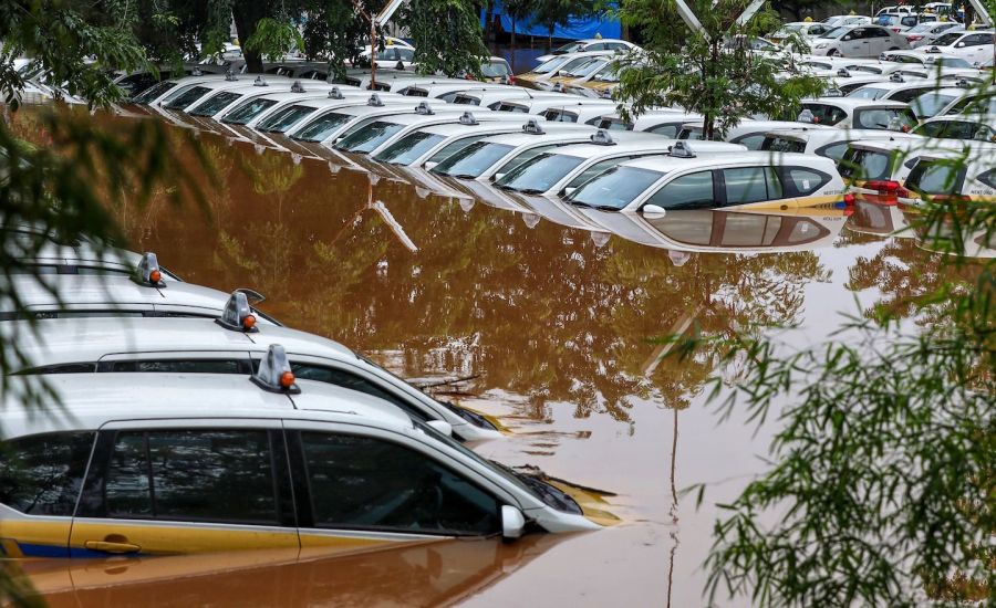 Deadly floods strike Indonesia as Australia burns