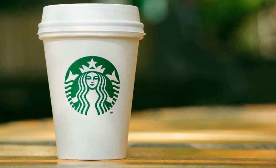 a starbucks cup on a counter