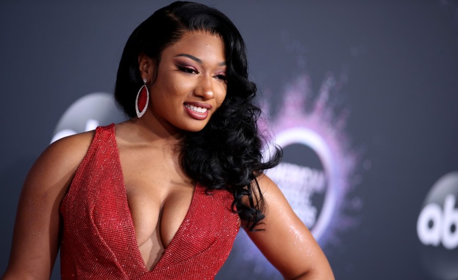 megan thee stallion in a red dress on the red carpet