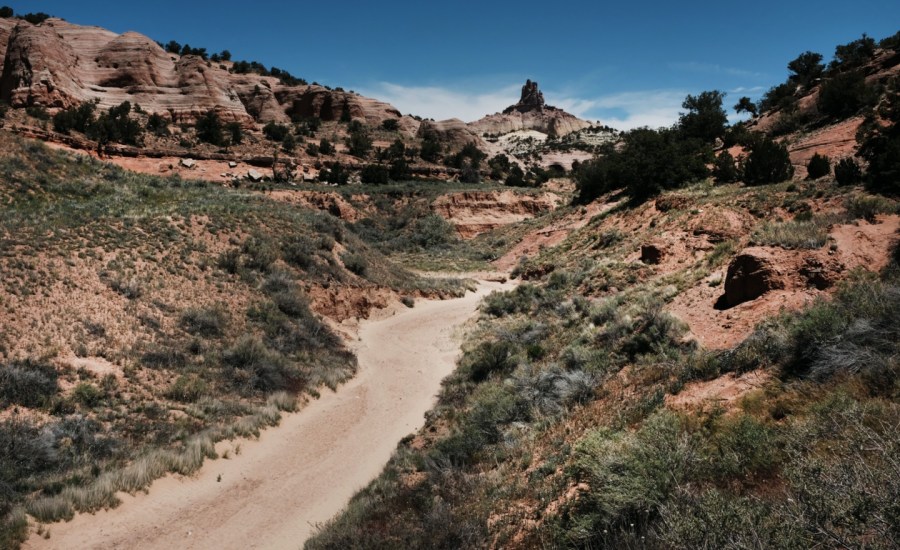 road stretches through a desert area of New Mexico that is part of Navajo nation