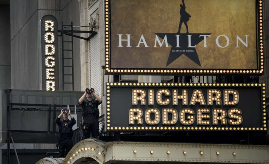 Members of the Secret Service counter sniper team watch over the Richard Rodgers Theatre while US President Barack Obama attends a showing of "Hamilton"