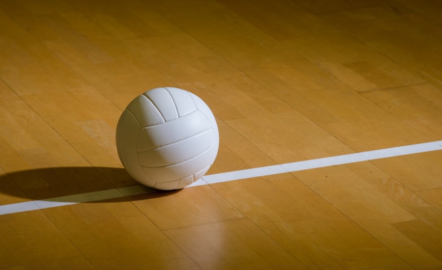 Volleyball court wooden floor with ball