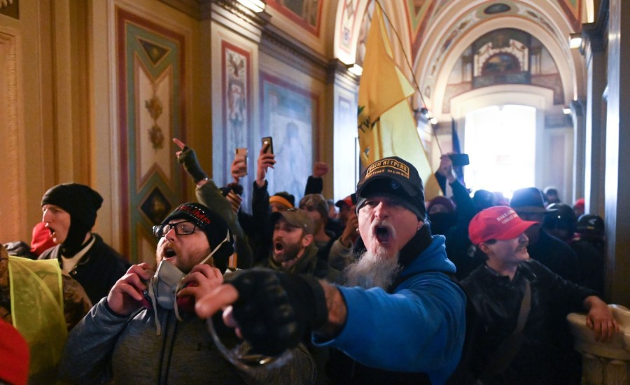 Trump-supporting protesters stream through the U.S. Capitol on January 6