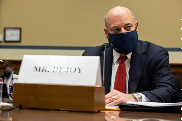 Postmaster General Louis DeJoy testifies at a hearing on Capitol Hill