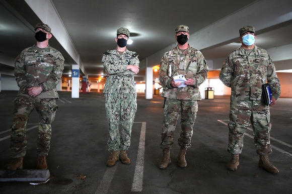 US service members at vaccination site