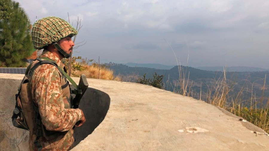 A Pakistani soldier monitors the border with India