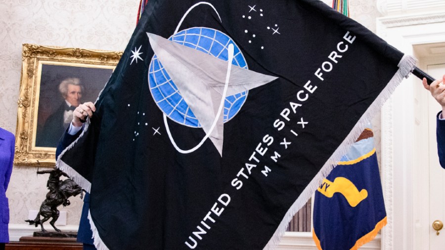 File - The United Space Force logo on a flag.