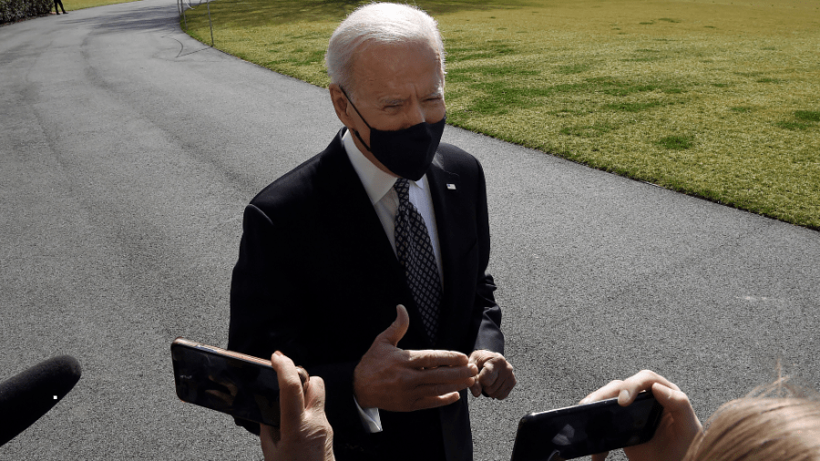 President Biden speaks with reporters outside the White House before departing for a trip to Atlanta