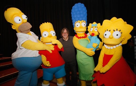 Creator Matt Groening poses with Simpson characters at "The Simpsons" Panel during the 2008 Comic Con