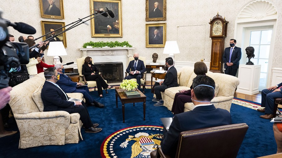 President Joe Biden speaks with members of the Congressional Hispanic Caucus