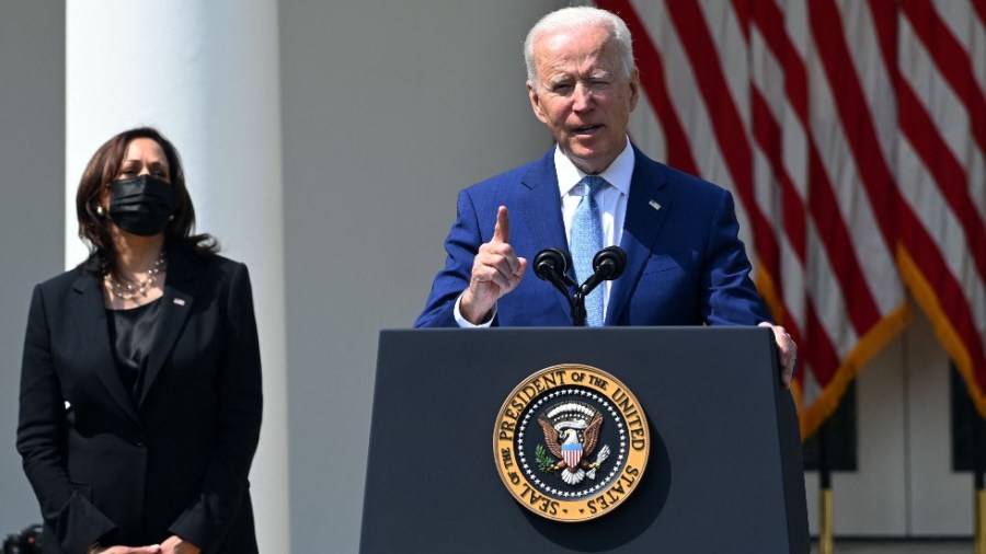 Vice President Harris listens to President Biden detail new executive actions to combat gun violence