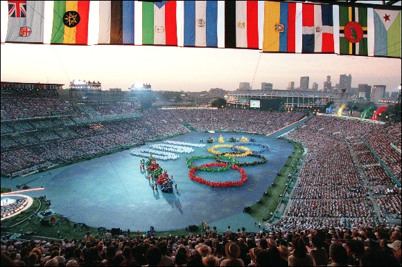 General view of the Olympic Stadium as performers form the Olympic rings and a one hundred number late 19 July 1996 in Atlanta.