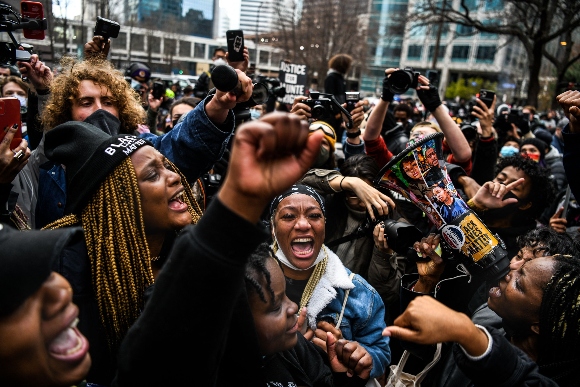 People celebrate as the verdict is announced in the trial of former police officer Derek Chauvin