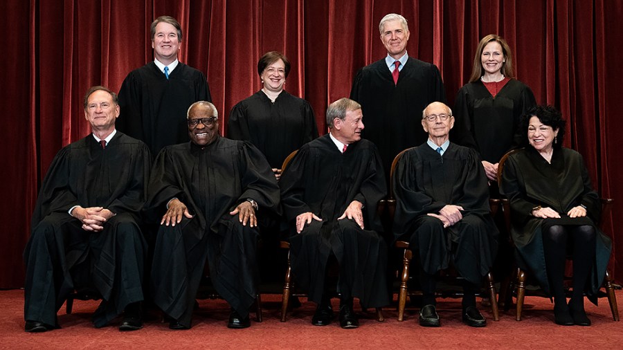 Supreme Court Justices pose for group photo with newly sworn in Justice Amy Coney Barrett on April 23, 2021