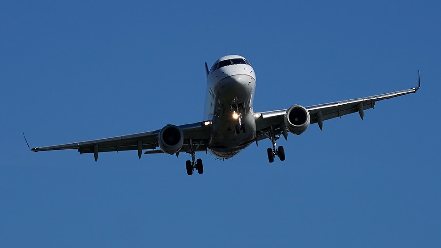 A United ERJ-170 lands at Ronald Reagan National Airport in Arlington, Va.