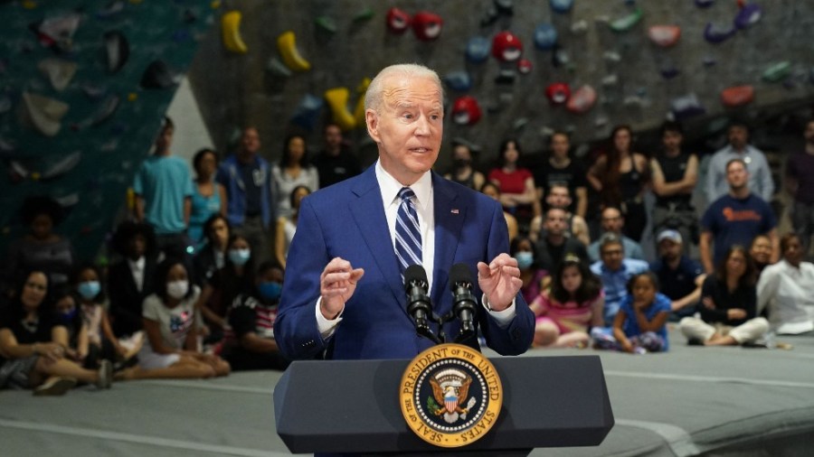 President Biden speaks at the Sportrock Climbing Centers in Alexandria, Va.