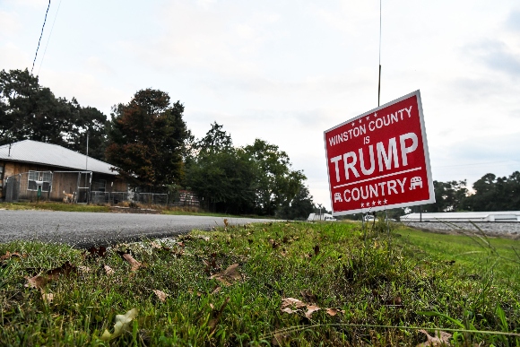 A "Trump Country" sign is seen outside of a house in Haleyville, Winston County, Alabama