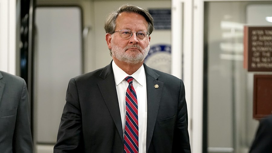 Sen. Gary Peters (D-Mich.) arrives to the Capitol for a series of votes on May 27