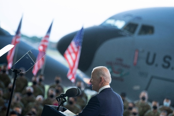 President Joe Biden addresses US Air Force personnel and their families stationed at Royal Air Force Mildenhall, Suffolk, England