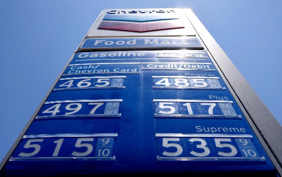 Gas prices are displayed at a Chevron station