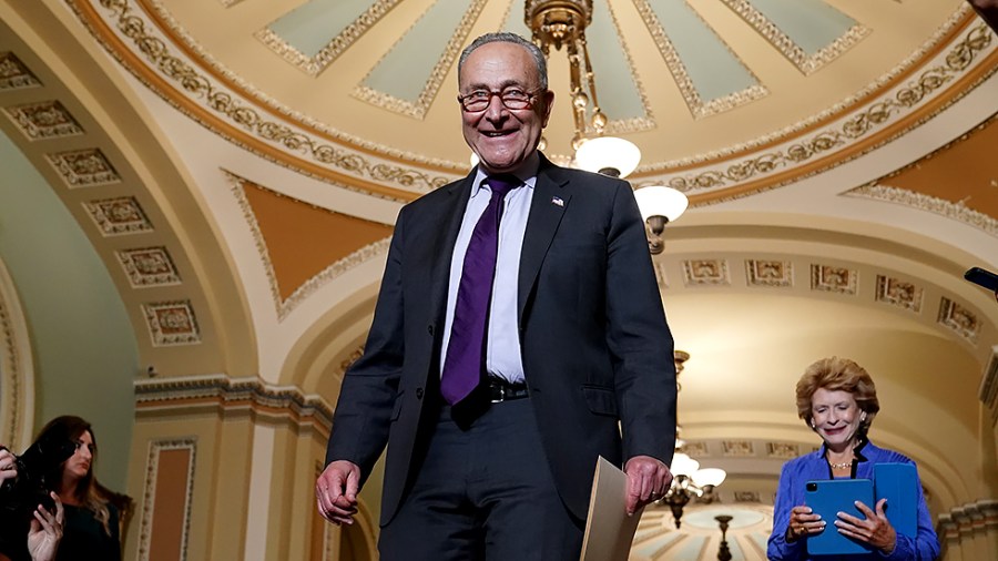 Majority Leader Charles Schumer (D-N.Y.) addresses reporters following the policy luncheon on June 15