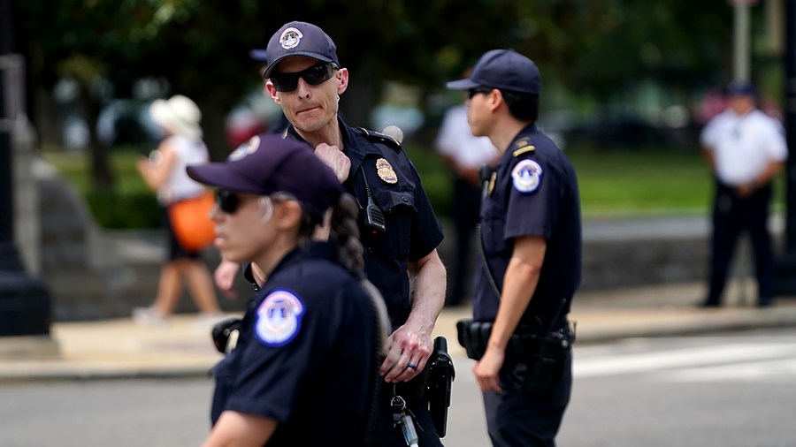 U.S. Capitol Police officers are seen as they detain protesters demonstrating during the Poor People’s Campaign’s Women’s Moral Monday March on Washington on Monday, July 19, 2021.