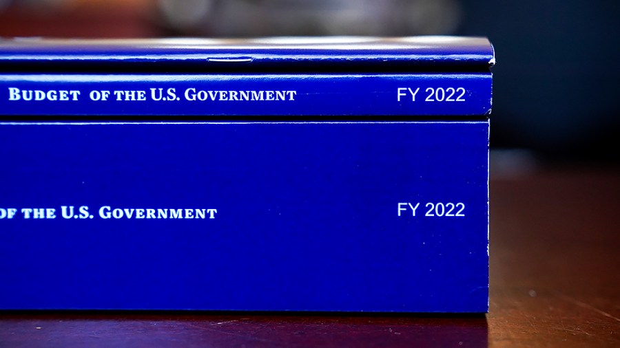 A copy of the FY 2022 budget from the Biden administration is arranged for a photograph on July 12