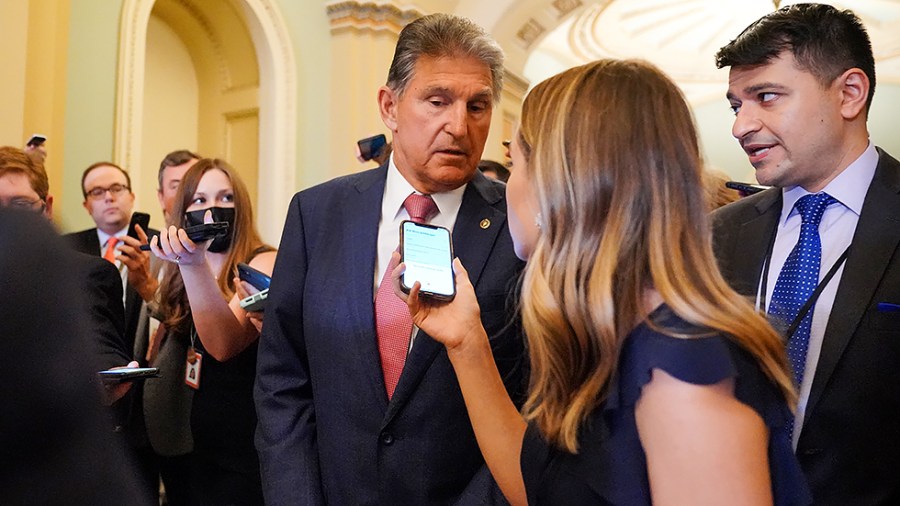 Sen. Joe Manchin (D-W.Va.) addresses reporters after the weekly Senate Democratic policy luncheon on Tuesday, July 27, 2021.