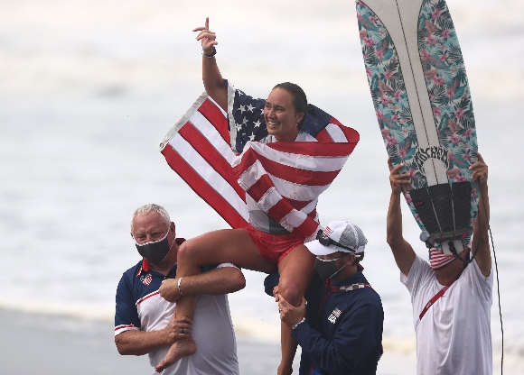 Carissa Moore of Team United States celebrates winning the Gold Medal