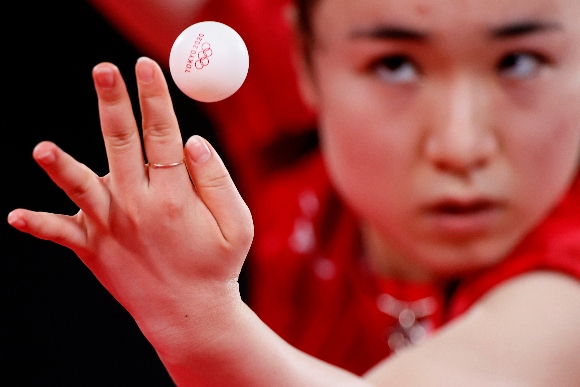 Ito Mima of Team Japan serves the ball during her Table Tennis Women's Singles Round of 16 match