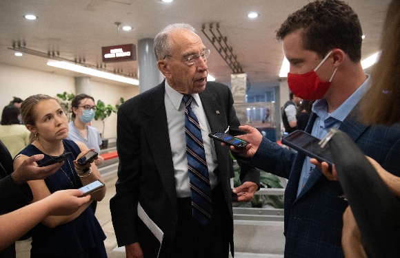 Sen. Chuck Grassley (R-Iowa) speaks to a reporter