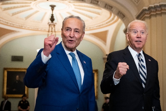 Senate Majority Leader Chuck Schumer (D-N.Y.) and  President Biden