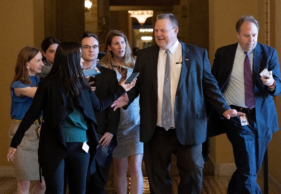 Sen. Jon Tester (D-Mont.) answers questions from reporters