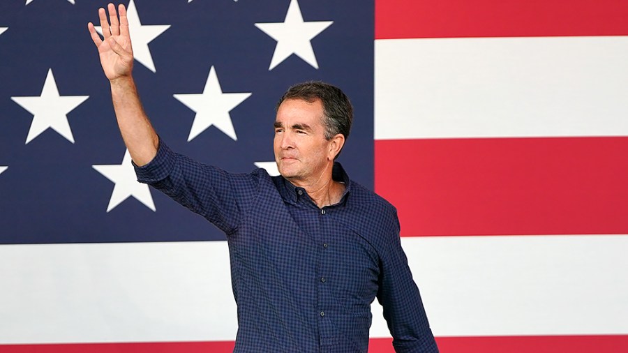 Virginia Governor Ralph Norhtam arrives to address supporters of Virginia Democratic gubernatorial candidate Terry McAuliffe at a grassroots campaign event at Lubber Run Park in Arlington, Va., on Friday, July 23, 2021.