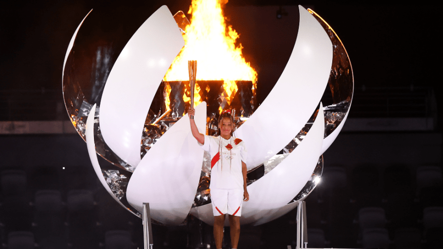 Japanese tennis start Naomi Osaka lights the Olympic torch at the Tokyo games