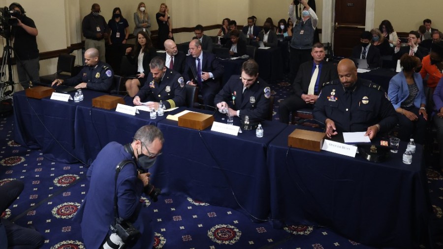 Four Capitol Police and DC Metropolitan Police Department Officers arrive to testify before the House Select Committee