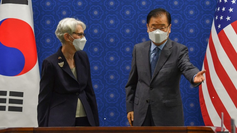 South Korean Foreign Minister Chung Eui-yong gestures to U.S. Deputy Secretary of State Wendy Sherman