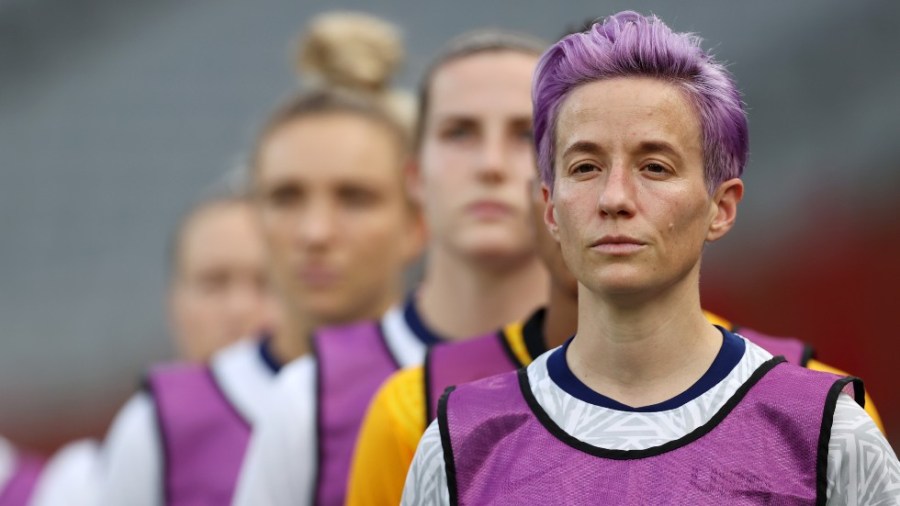 The U.S. Women’s National Soccer Team warms up before a match against Sweden in Tokyo