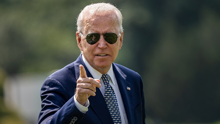 President Biden walks from Marine One after arriving on the South Lawn of the White House from Wilmington, Del., on Tuesday, August 10, 2021.