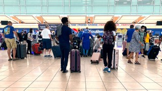 Passengers ares seen at BWI Airport in Baltimore, Md., on Monday, August 16, 2021.