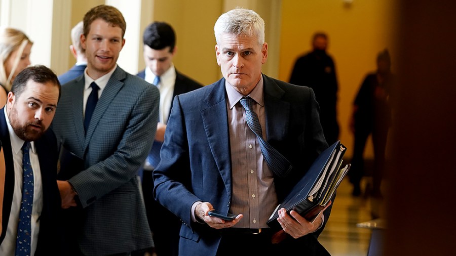 Sen. Bill Cassidy (R-La.) leaves a meeting with Senate Republicans to discuss the bipartisan infrastructure bill on Wednesday, July 28, 2021.