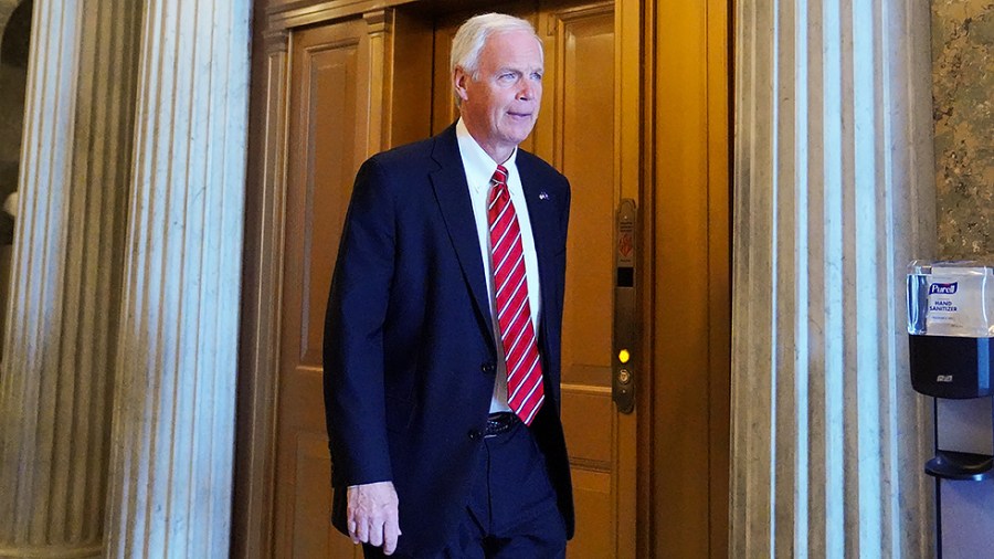 Sen. Ron Johnson (R-Wis.) leaves the Senate Chamber after the first vote of the week on Monday, July 19, 2021.