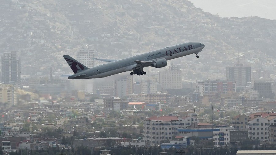 A passenger plane lifts off from the airport in Kabul