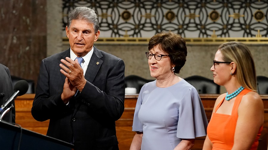 Sens. Joe Manchin (D-W.Va.), Susan Collins (R-Maine) and Kirsten Sinema (D-Ariz.) are seen at a press conference after a key vote regarding bipartisan infrastructure legislation on Wednesday, July 28, 2021.