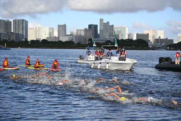 Competitors take part in the women's 10km marathon swimming event during the Tokyo 2020 Olympic Games