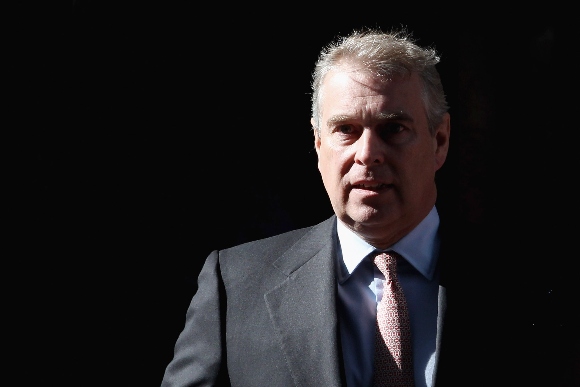 Prince Andrew, Duke of York, leaves the headquarters of Crossrail at Canary Wharf in London