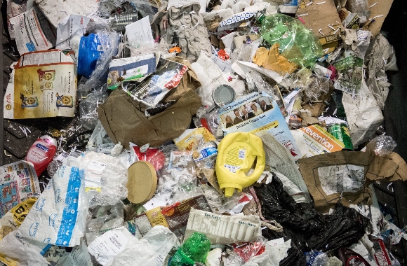 Recycling material moves along a conveyor belt to be sorted at the Waste Management Material Recovery Facility in Elkridge, Maryland