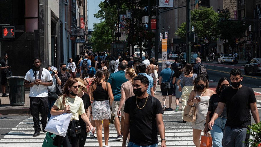 People walk on a street in New York City